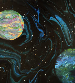 poured acrylic painting of planets by Lucy Arnold